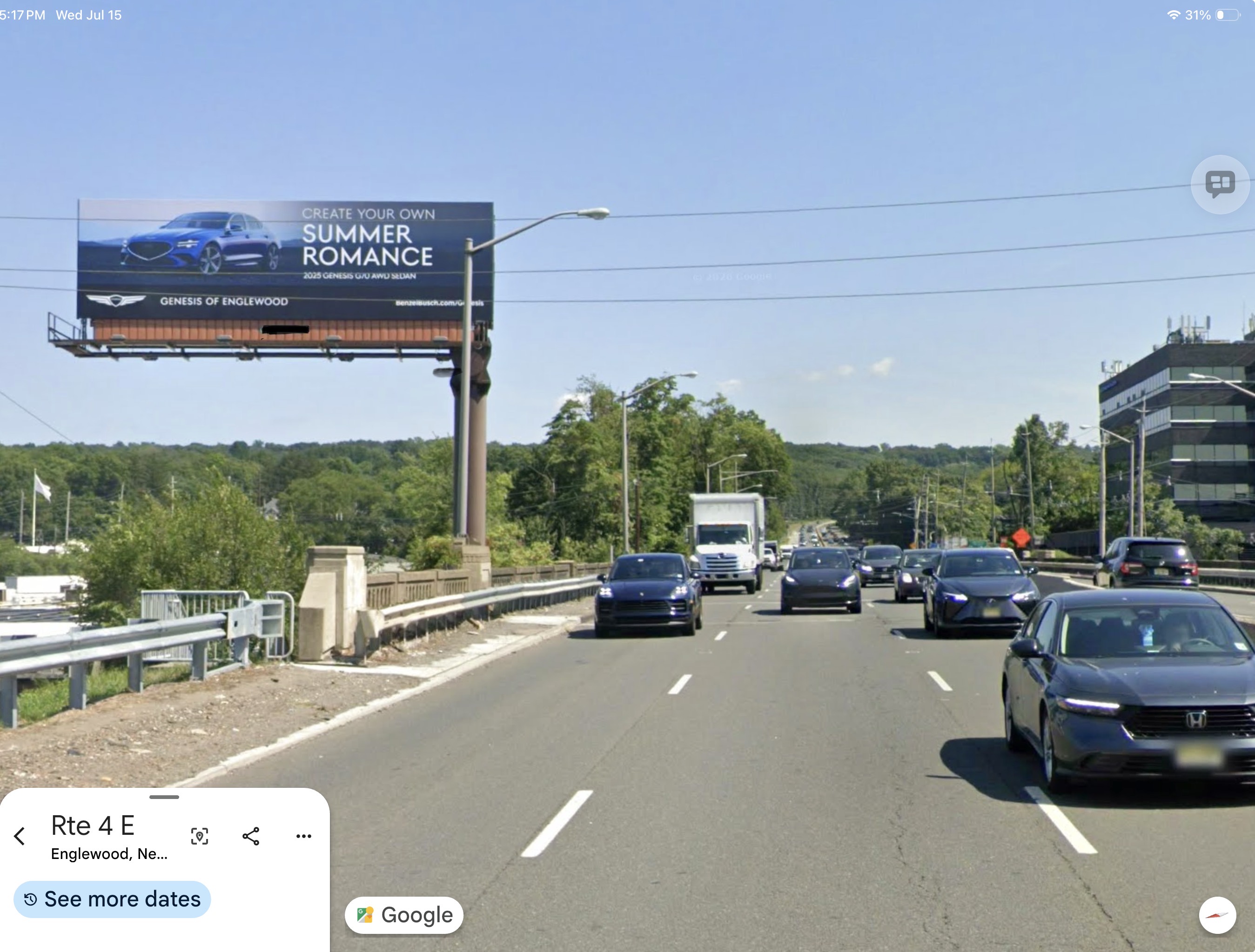 Genesis of Englewood billboard on Route 4